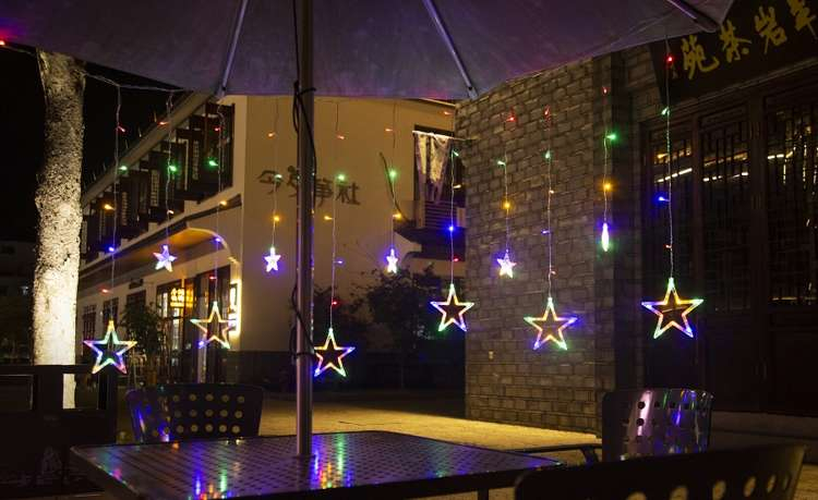 LED Christmas Outdoor and indoor garland curtain with stars / 550 cm / RGB - multi-colored / 3.5W / 138 LEDs / IP44 / 8 modes / 5902802917317 / 19-606